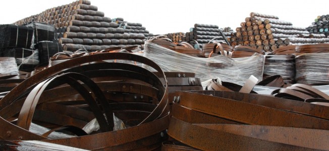 Piles of old barrels and bands outside the cooperage.